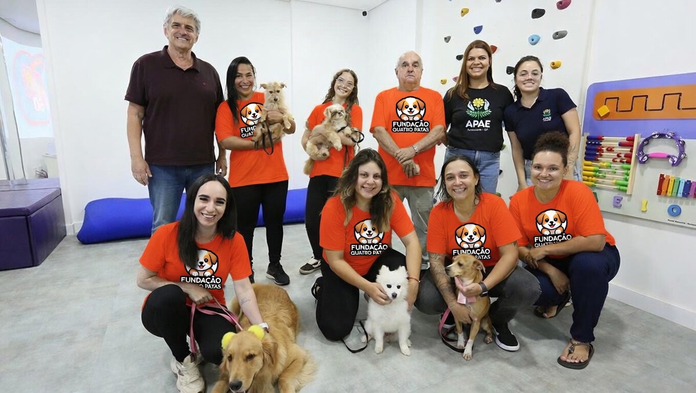 Equipe e animais do refúgio